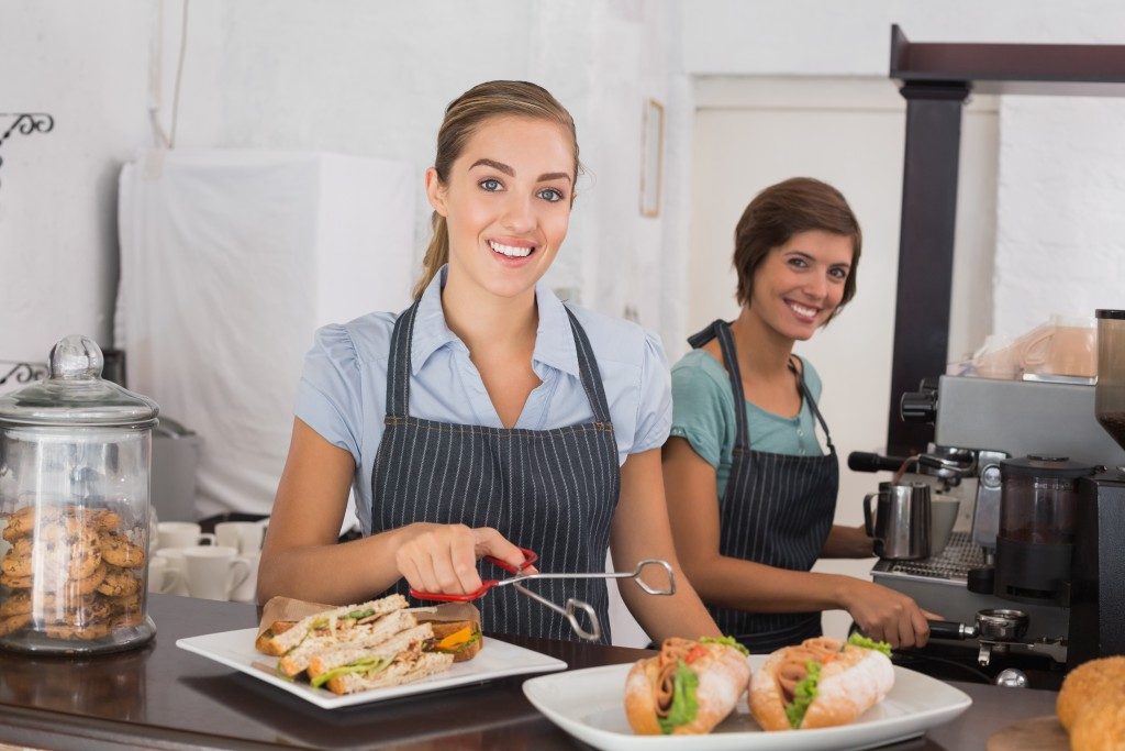 two waitresses working