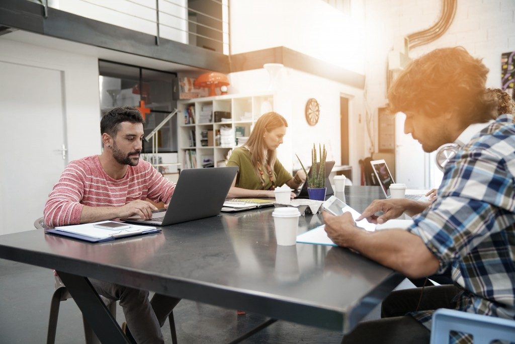 people at a coworking space working together