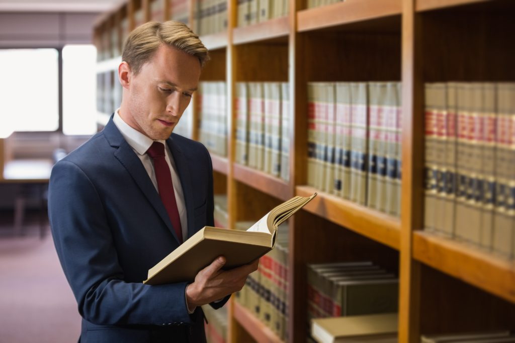 Lawyer reading at a library