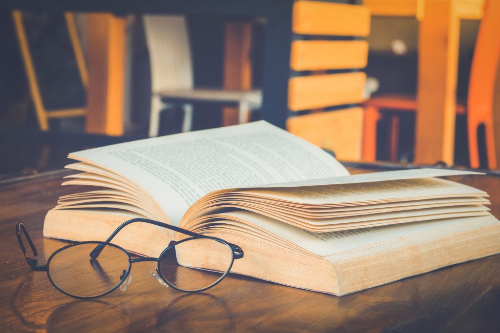 Thick Law book and glasses