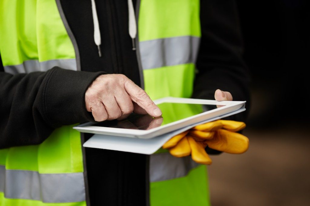 a man using an iPad