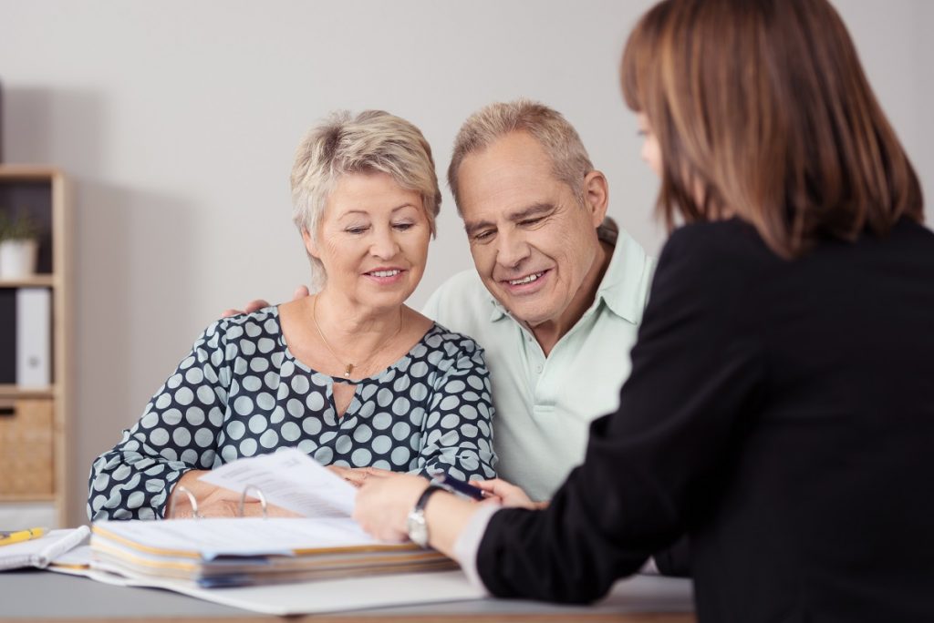 Couple talking to an estate planning attorney