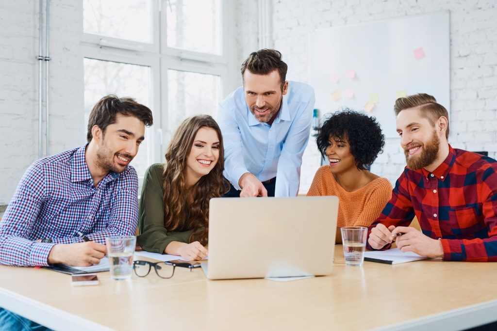 Advertising agency employees having a meeting