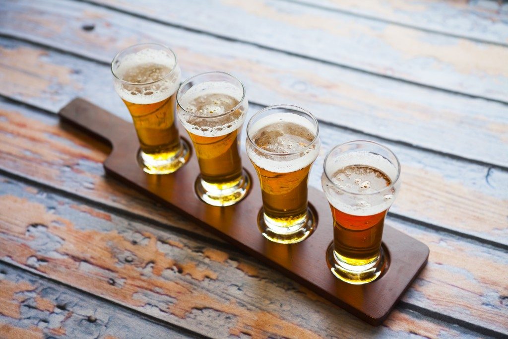 four glasses of beer