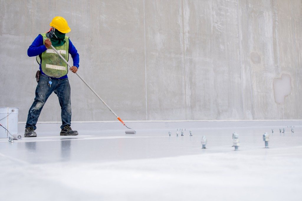 construction man fixing floor