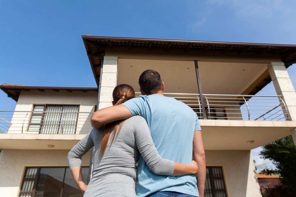 Couple looking at the house