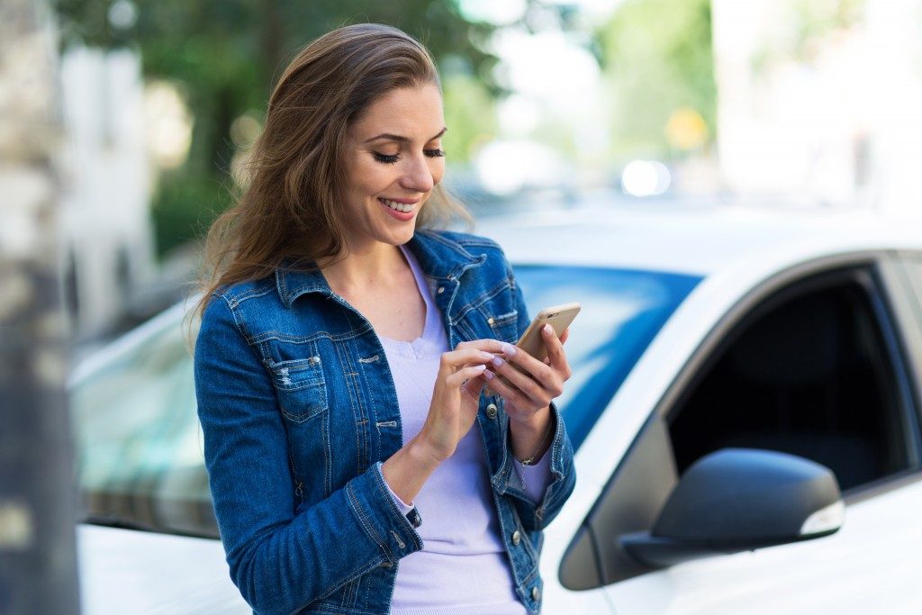 woman reading from phone